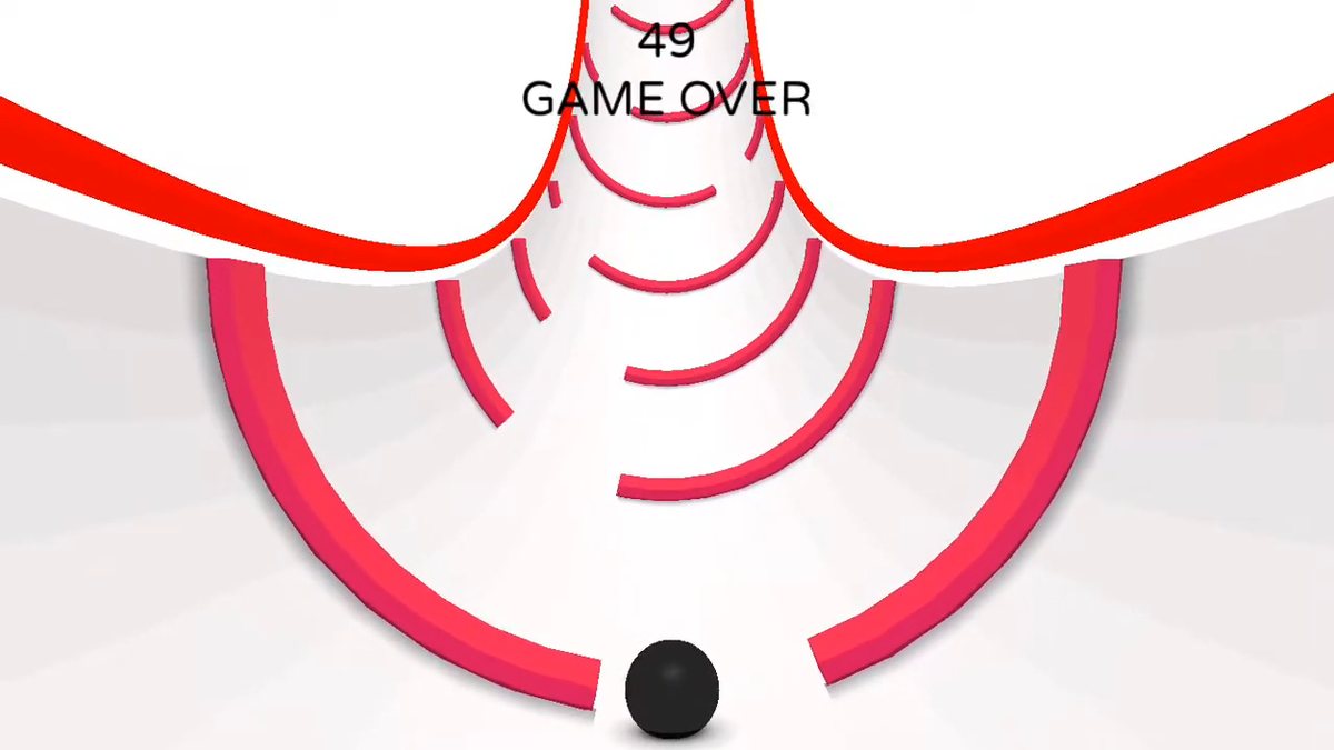 The 2015 Unity prototype: a white tunnel with red arcs, a black ball, and 49 GAME OVER at the top